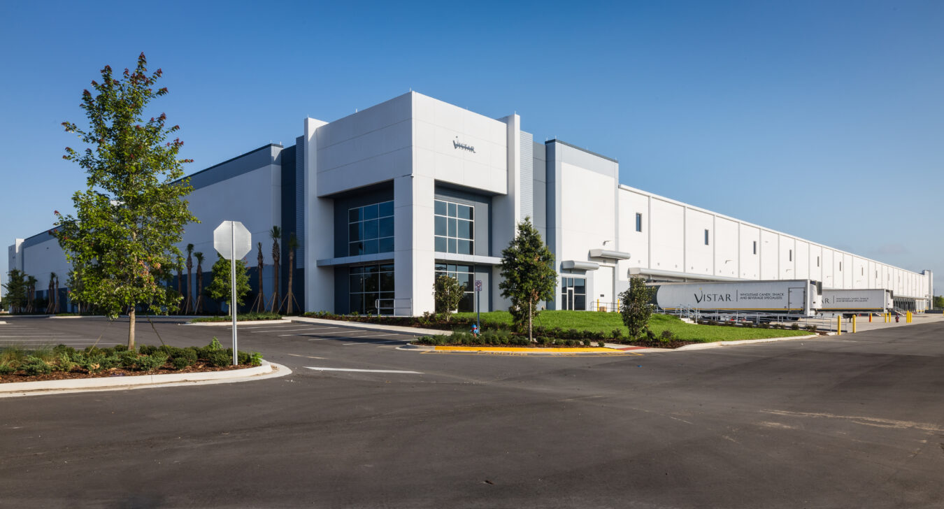 Aerial view of a large warehouse with many loading docks.